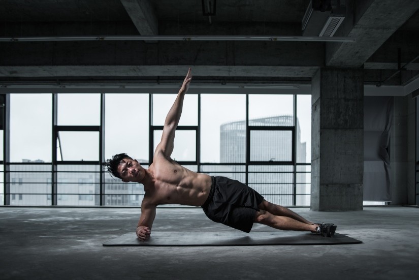 person doing a side plank post