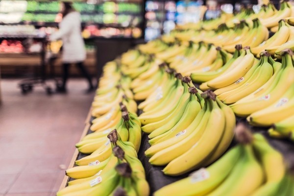 Supermarket stand of bananas