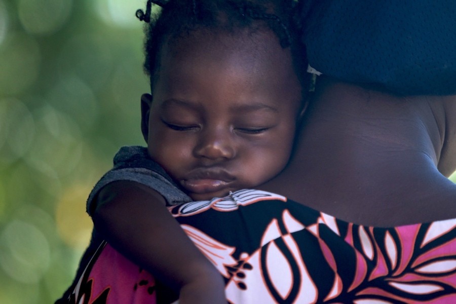 baby sleeping on shoulder