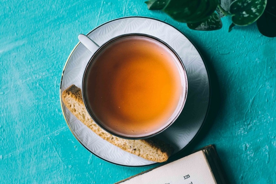 cup of tea on blue background