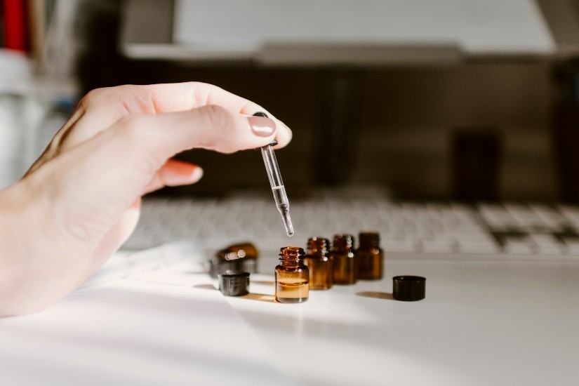 brown oil bottle with dropper