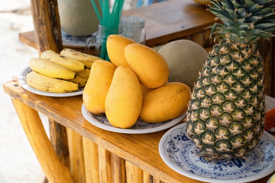 tropical fruit on wooden bar
